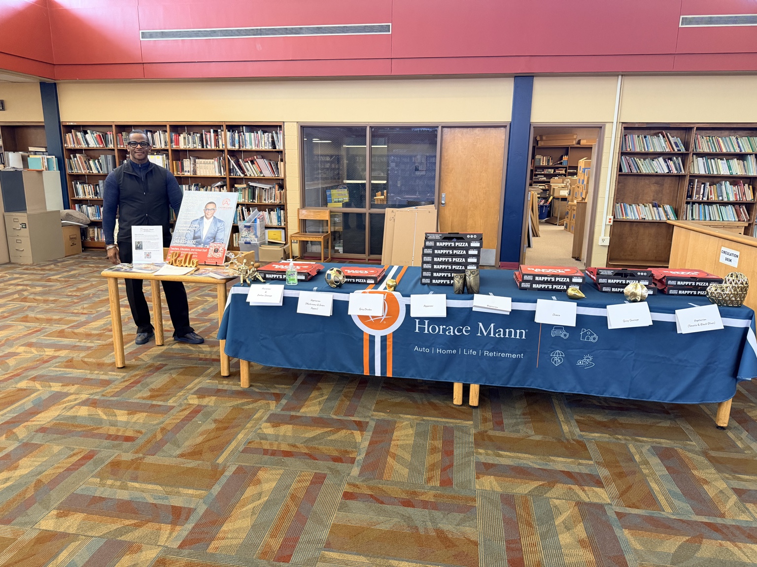 Calvin Carey serving educators at a Horace Mann school event